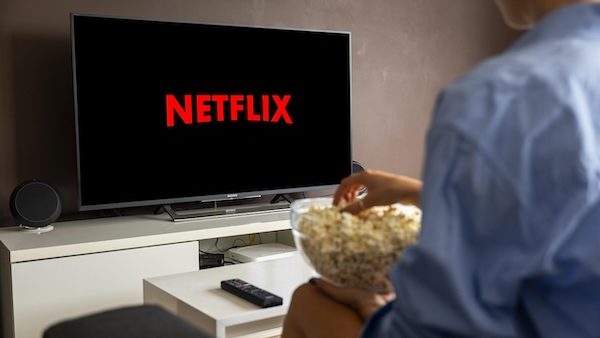 person watching netflix sports docuseries