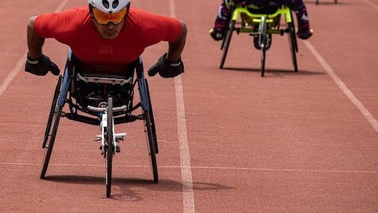 Paralympic athletes racing on track