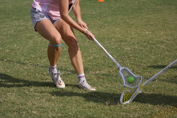 lacrosse player on the field