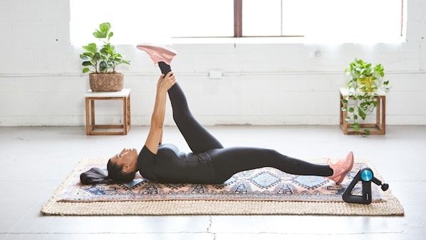 athlete stretching to recover